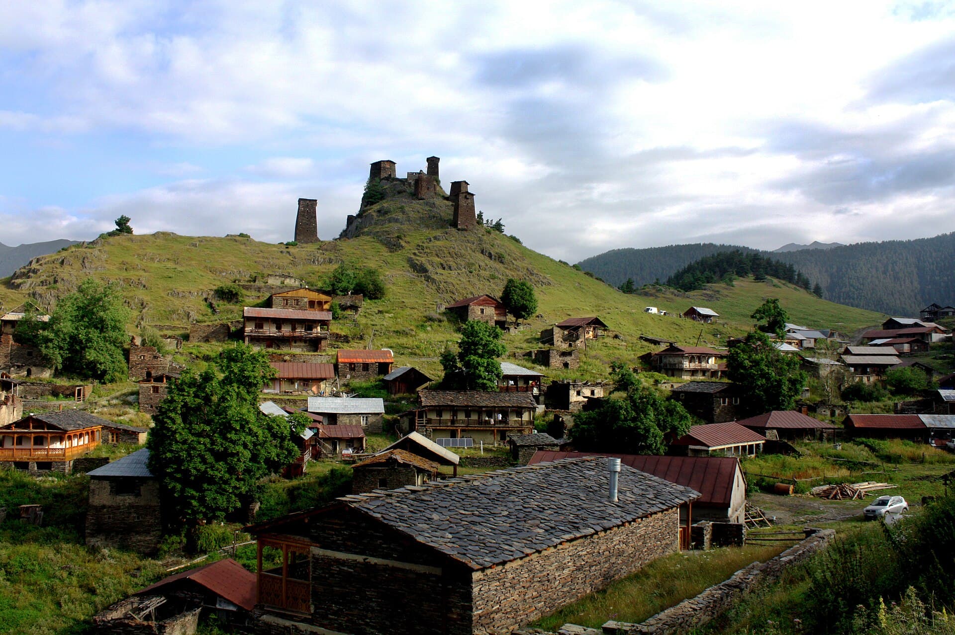 Houses of Upper Omalo below the hilltop towers of Keselo fortress, Tusheti